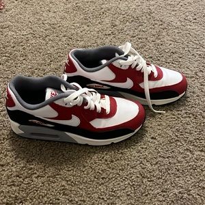 Red, white and black Nike Air Max